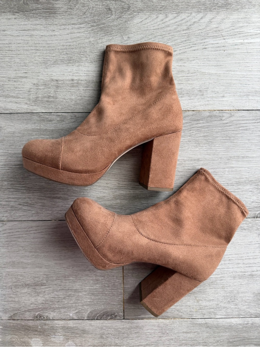 pair of brown faux-suede platform sock boots